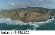 Aerial view of lighthouse at Cape Roca in Portugal (2019 год). Стоковое видео, видеограф Михаил Коханчиков / Фотобанк Лори
