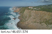 Aerial view of lighthouse at Cape Roca in Portugal (2019 год). Стоковое видео, видеограф Михаил Коханчиков / Фотобанк Лори