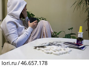 Больная во время приема лекарств. Стоковое фото, фотограф Наталья Шатохина/NEWS.ru / ТАСС / Фотобанк Лори