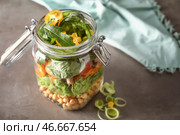 Вкусный овощной салат в масонной банке на сером столе. Стоковое фото, фотограф Pixel_shot / Фотобанк Лори
