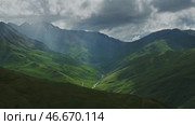 Mountain landscape with sun rays. Стоковое видео, видеограф Михаил Коханчиков / Фотобанк Лори