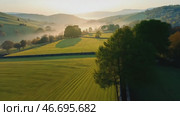 Beautiful landscape with a foggy morning sky. Стоковое AI-видео, аниматор Sergey Grishin / Фотобанк Лори