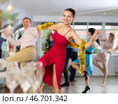 Paso doble dance during Christmas or New Year celebrations in dance studio. Стоковое фото, фотограф Яков Филимонов / Фотобанк Лори