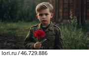 The concept of the May 9th holiday. Portrait of a handsome boy in khaki clothes with red carnation flowers. Celebration of Victory Day 1941-1945. Стоковое AI-изображение, AI-художник Photojuli / Фотобанк Лори