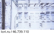 Top view of small electrical substation with rows of transformers in suburbs. Стоковое фото, фотограф David Kashakhi / Фотобанк Лори