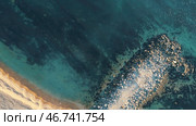 Aerial view of the rusty sunken ship stuck on a rocky shoal. Стоковое фото, фотограф David Kashakhi / Фотобанк Лори