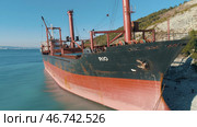View on large red tanker ship in the sea near the shore. Стоковое фото, фотограф David Kashakhi / Фотобанк Лори