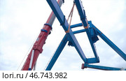Moscow, Russia - September 2018: Gantry crane with hook for lifting. Редакционное фото, фотограф David Kashakhi / Фотобанк Лори
