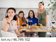 Female friends during family quarrel accuse Caucasian woman. Стоковое фото, фотограф Яков Филимонов / Фотобанк Лори