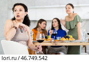 Female friends during family quarrel accuse Caucasian woman. Стоковое фото, фотограф Яков Филимонов / Фотобанк Лори