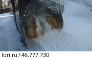 Winter cleaning of sidewalks. Iron blades of a snowplow close-up. Стоковое видео, видеограф Кутина Татьяна / Фотобанк Лори