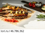 Вкусная скумбрия рыба на белом столе. Стоковое фото, фотограф Pixel_shot / Фотобанк Лори