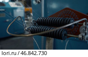 Coil winder machine with copper wire. Creative. Copper round rollers for rolling wire at the factory. Стоковое фото, фотограф Данил Руденко / Фотобанк Лори