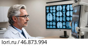 A neurosurgeon discusses brain surgery. Стоковое AI-изображение, AI-художник Александр Поташев / Фотобанк Лори