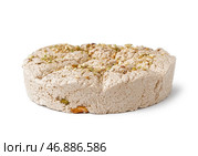Вкусная халва тахини с фисташками на белом фоне. Стоковое фото, фотограф Pixel_shot / Фотобанк Лори