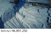 Aerial view of big career with excavators and trucks at work, heavy industry and extraction of minerals concept. Стоковое фото, фотограф David Kashakhi / Фотобанк Лори