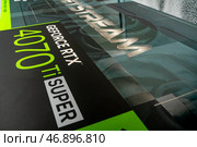 State-of-the-art nvidia graphics card, geforce rtx 4070 ti super, featuring robust performance capabilities. unboxing new hardware innovation, enhancing gaming, rendering, and machine learning processes. (2024 год). Редакционное фото, фотограф Андрей Ка / Фотобанк Лори