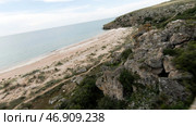 Aerial view of rocks and sea shore, summer and holiday concept. Стоковое фото, фотограф David Kashakhi / Фотобанк Лори
