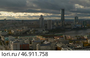 The view from the drone.Beautiful Yekaterinburg.Stock footage.Gray City, the largest of the Urals, filmed in the center of the city with all the high-rises and the long Iset River is visible. Стоковое фото, фотограф David Kashakhi / Фотобанк Лори