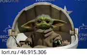 Russia, Moscow - May 30 ,2022:HDR.An exhibition of new technologies made like real ones, one spider that can move and Master Yoda who blinks and wiggles his ears. Редакционное фото, фотограф David Kashakhi / Фотобанк Лори