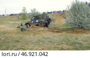 Driver competing in an off-road 4x4 competition. Стоковое фото, фотограф David Kashakhi / Фотобанк Лори