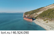View on large red tanker ship in the sea near the shore. Стоковое фото, фотограф David Kashakhi / Фотобанк Лори
