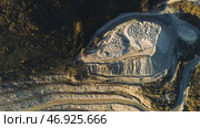 Top view of picturesque quarry located on coastal mountain near village in forest. Стоковое фото, фотограф David Kashakhi / Фотобанк Лори