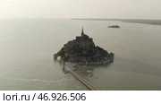 Aerial view of breathtaking Mont-Saint-Michel located, Normandy, France. Стоковое фото, фотограф David Kashakhi / Фотобанк Лори