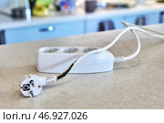Charred extension cord with tee that overheated and caused short circuit. Стоковое фото, фотограф Владимир Григорьев / Фотобанк Лори