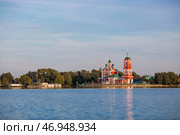 The Golden Ring of Russia, the city of Pereslavl-Zalessky. The Church of the Forty Sevastian Martyrs is reflected at sunset in Pleshcheyev Lake. Стоковое фото, фотограф Photojuli / Фотобанк Лори