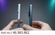 USA, New York - September 15, 2023: Comparison of new iPhones. Редакционное фото, фотограф David Kashakhi / Фотобанк Лори