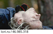 Young man died as result of fall from cliff in forest. Стоковое фото, фотограф David Kashakhi / Фотобанк Лори