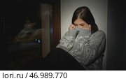 Woman with psychological illness or disorder alone at home. Стоковое фото, фотограф David Kashakhi / Фотобанк Лори