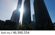 A low angle view of the skyscrapers in the centre of Dubai. Стоковое фото, фотограф David Kashakhi / Фотобанк Лори