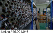 A large warehouse of products in rolls. Стоковое фото, фотограф David Kashakhi / Фотобанк Лори