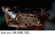 Close up of glossy stone mineral on a blurred background. Стоковое фото, фотограф David Kashakhi / Фотобанк Лори