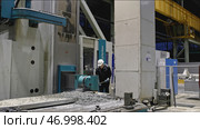 Automated machine that cuts wood or metal with chips. Стоковое фото, фотограф David Kashakhi / Фотобанк Лори