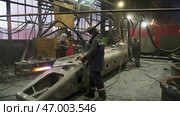 An Industrial Workshop where Workers Fabricate various Metal Components for production. Стоковое фото, фотограф David Kashakhi / Фотобанк Лори