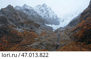 Breathtaking autumn mountainous landscape with withered grass. Стоковое фото, фотограф David Kashakhi / Фотобанк Лори