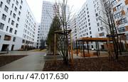 Large high-rise houses around enclosed courtyards with playgrounds. Стоковое фото, фотограф David Kashakhi / Фотобанк Лори