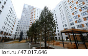 Large high-rise houses around enclosed courtyards with playgrounds. Стоковое фото, фотограф David Kashakhi / Фотобанк Лори