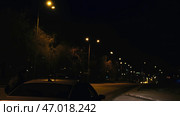 Flashing lights of police signal standing by side of night city. Стоковое фото, фотограф David Kashakhi / Фотобанк Лори