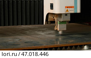 The process of cutting metal sheet by automatic laser machine. Стоковое фото, фотограф David Kashakhi / Фотобанк Лори