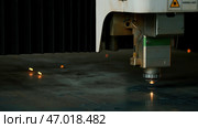 Modern metal laser cutter in action. Стоковое фото, фотограф David Kashakhi / Фотобанк Лори