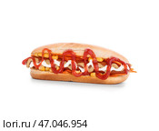 Вкусный хот-дог на белом фоне. Стоковое фото, фотограф Pixel_shot / Фотобанк Лори