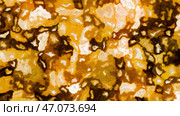 Computer generated abstract background of multicolor mosaic of oval shape. Стоковая иллюстрация, иллюстратор David Kashakhi / Фотобанк Лори