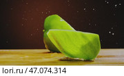 A Fresh and Vibrant Green Bell Pepper Presented Beautifully on a Rustic Wooden Table. Стоковое видео, видеограф Владимир Ковальчук / Фотобанк Лори
