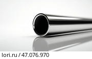 A smooth stainless steel pipe section, placed horizontally on a white background. Стоковое AI-изображение, AI-художник Katsiaryna Repich / Фотобанк Лори