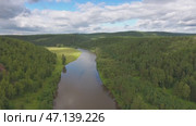 Aerial of cave in rock on Yuryuzan river in Russia. Стоковое видео, видеограф Михаил Коханчиков / Фотобанк Лори