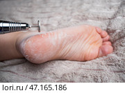 Hardware pedicure for yourself, chiropody and podology concept, foot care. Стоковое фото, фотограф Станислав Тарко / Фотобанк Лори